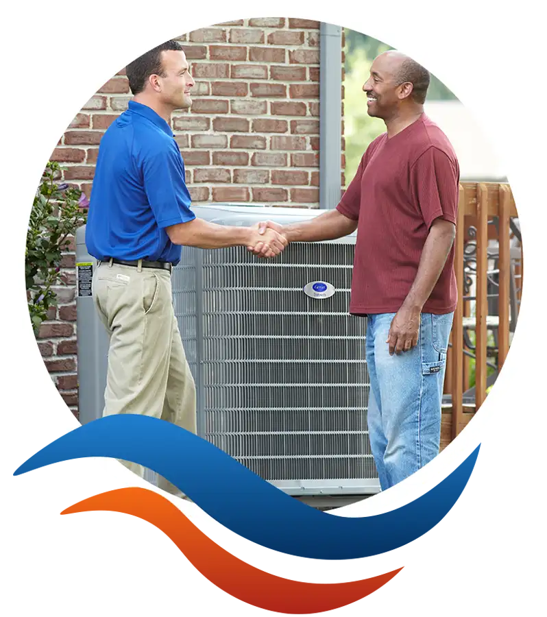 Lincoln Heating & Air technician shaking hands with satisfied homeowner after Carrier AC service in Springfield, IL