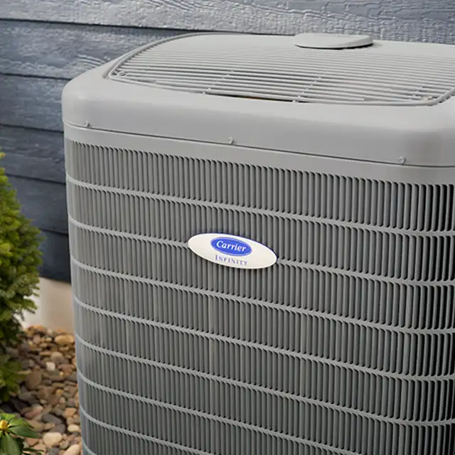 Close-up of a Carrier Infinity air conditioning unit maintained by Lincoln Heating & Air in Springfield, IL
