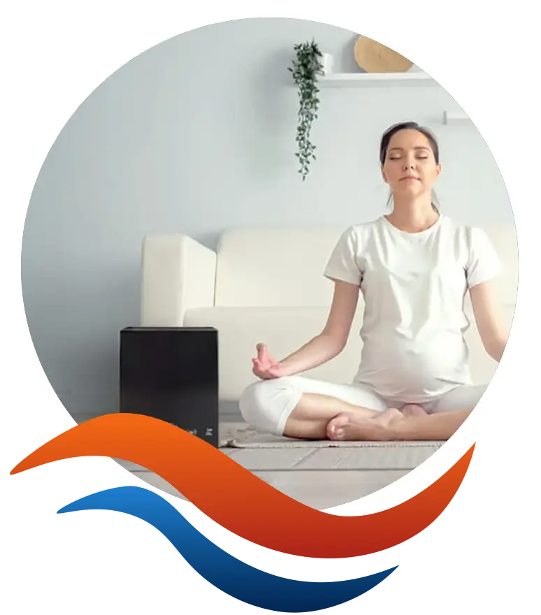 A woman meditating peacefully beside The Aerus Pure & Clean air purifier in a clean, healthy home — Lincoln Heating & Air, Springfield, IL