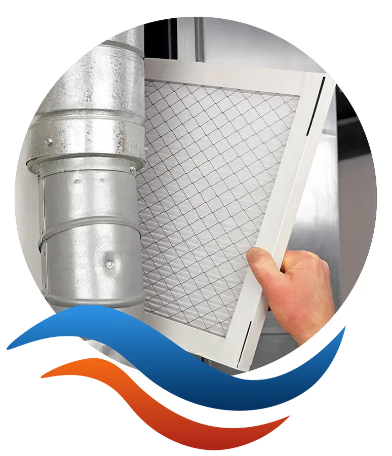 Homeowner replacing an HVAC air filter along ductwork with guidance from Lincoln Heating & Air in Springfield, IL